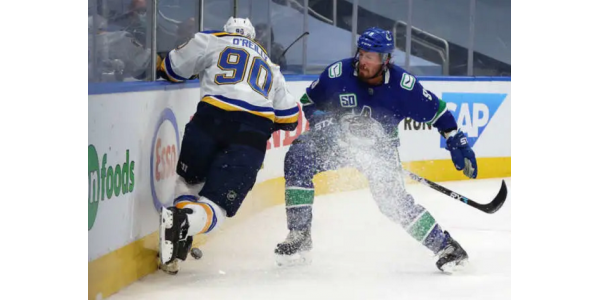 Score total des Canucks de 4-2 pour se qualifier pour la troisième ronde des séries éliminatoires